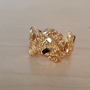 Elegant Gold Textured Ring plated most likely